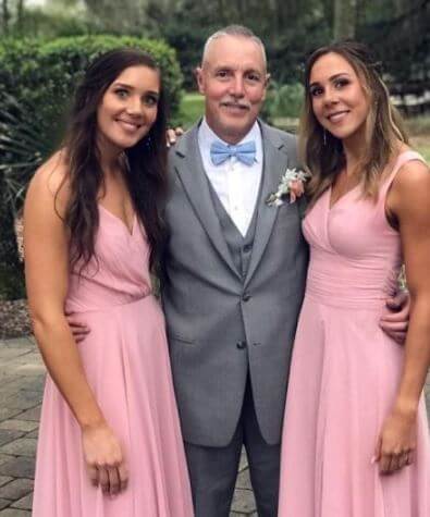 Michael Dressel with his beautiful daughters at his son Caeleb Dressel wedding.